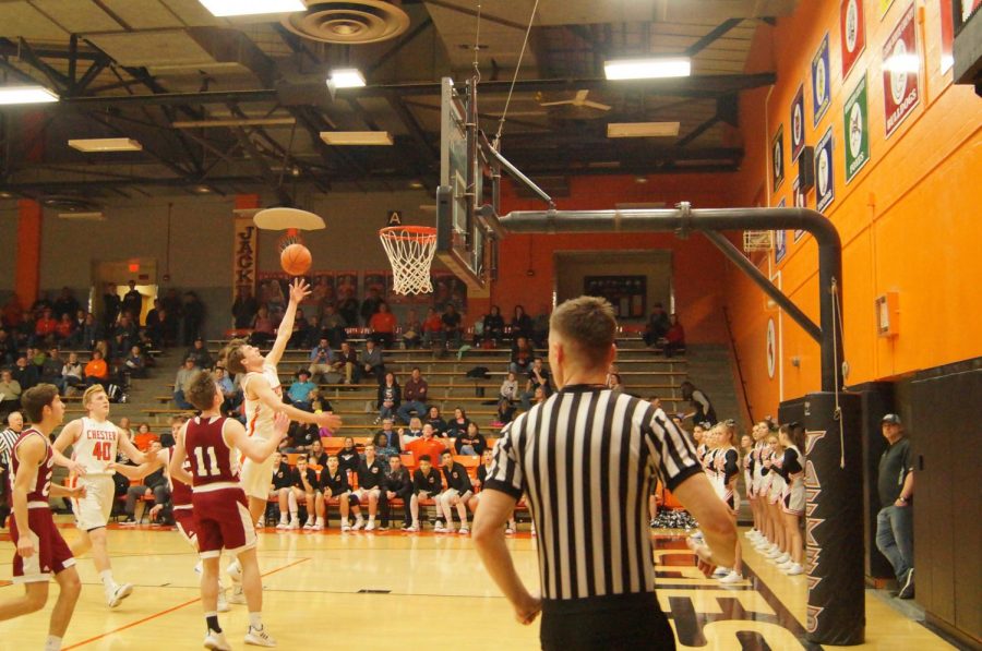 Colin Wingerter drives to the basket against Gibault.