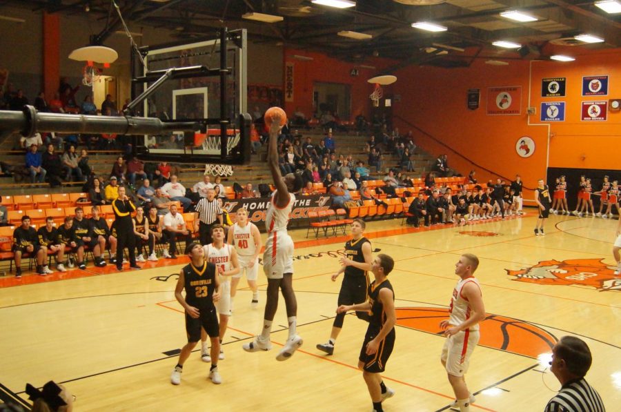 Keith Kiner III slams home a dunk against Trico. Kiner scored his 1,000th career point in the CIT.