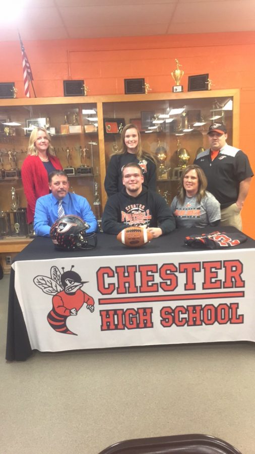 Chase+Colvis+%28seated%2C+center%29+signed+a+letter+of+intent+to+play+football+at+McKendree+College.+The+senior+lineman+was+an+all-conference+selection+and+was+also+named+ot+the+All-South+team+for+the+8-3+Yellow+Jackets.