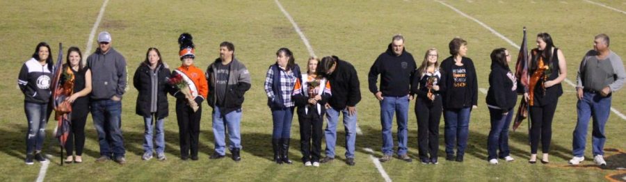 Senior members of the band and flag corp were honored during halftime of the Chester-Carmi football game.