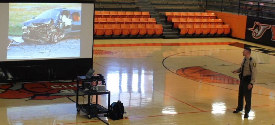 Illinois State Police Trooper Josh Korando gave a presentation on distracted driving at Chester High School Dec. 4.