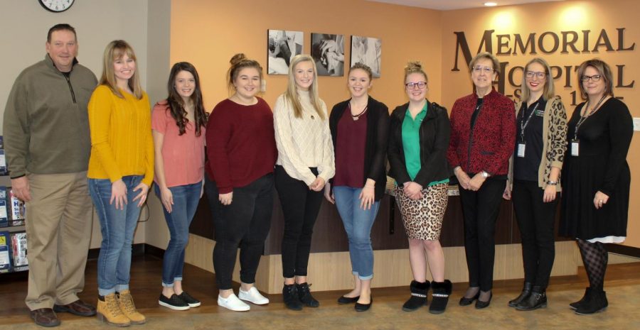 The Pathfinders for 2019-20 were announced. Pictured are Dan Colvis, board member; Pathfinders Mallary Vasquez, Ashtyn Jany, Mabry Miles, Avery Runge, Alexandria Hennerichs, Victoria Frederking, and Brianna Surman (not pictured in this photo); Auxiliary President Mardell Granger; Community Relations & Marketing Manager Mariah Bargman; and Chief Nursing Officer Susan Diddlebock.