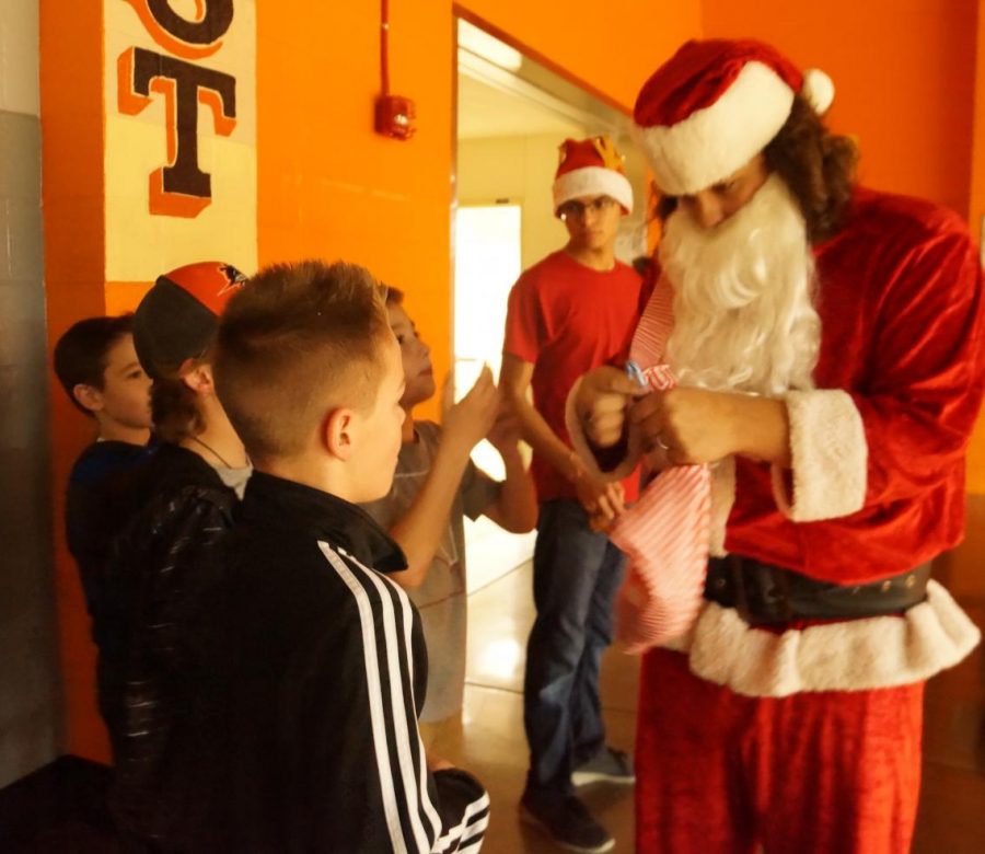Santa Claus, a close friend of Sting Entertainment Editor Wes Carpenter, distributed candy canes at the Chester-Sesser boys basketball game.