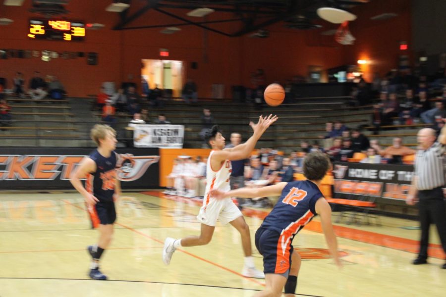 Jared Landeros chases a loose ball against Carterville.