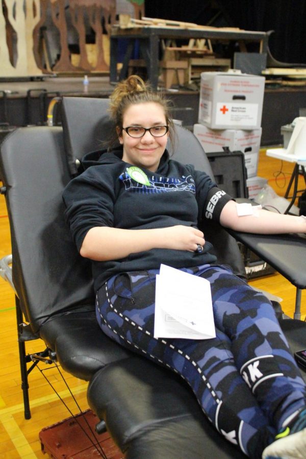 Deborah Wills donates blood.
