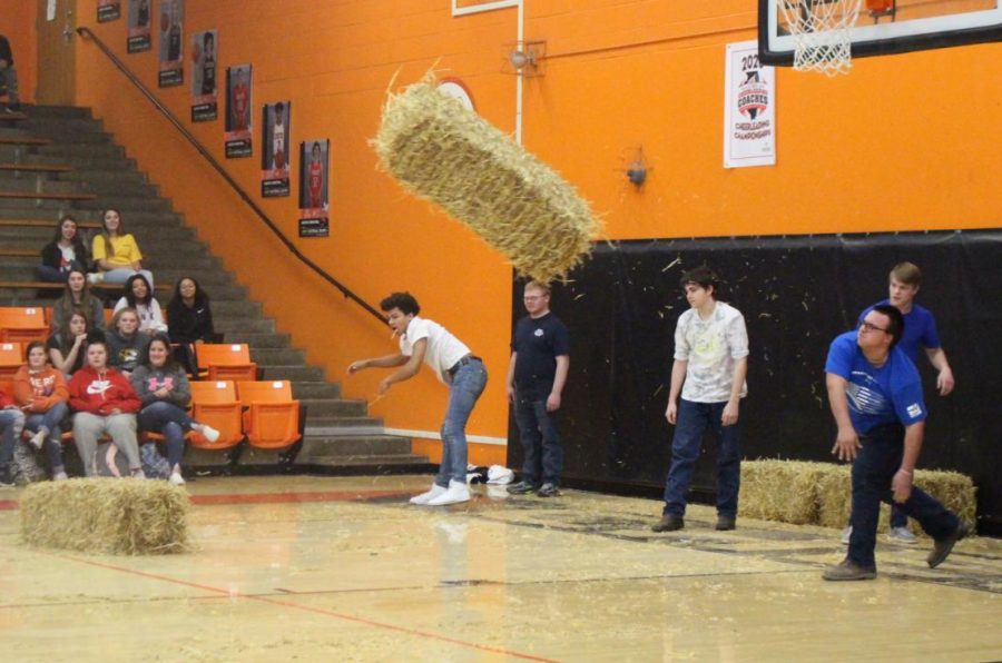 Jerald Copple shows his winning form during the hay bale toss Feb. 27 at the FFA Games.
