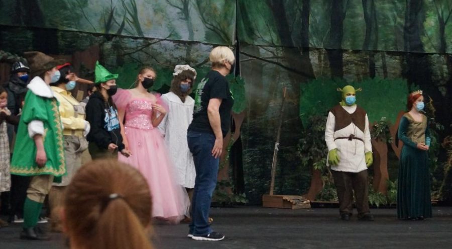 Mrs. Coop directs the cast of Shrek during a recent rehearsal. This will be her last production, as she is retiring after this school year.