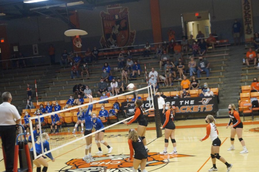 Kailyn Absher goes for a kill in the win over Sparta.