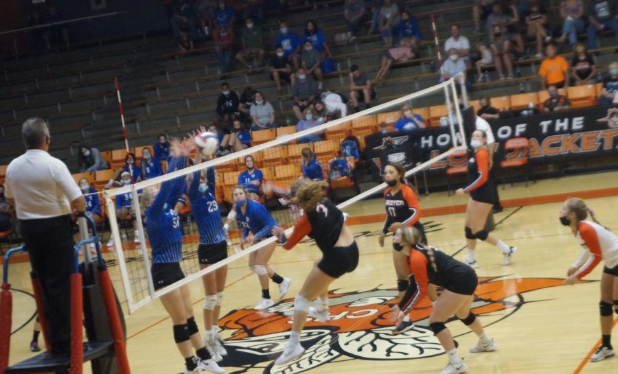 Mabry Wingerter goes to the net against Sparta.