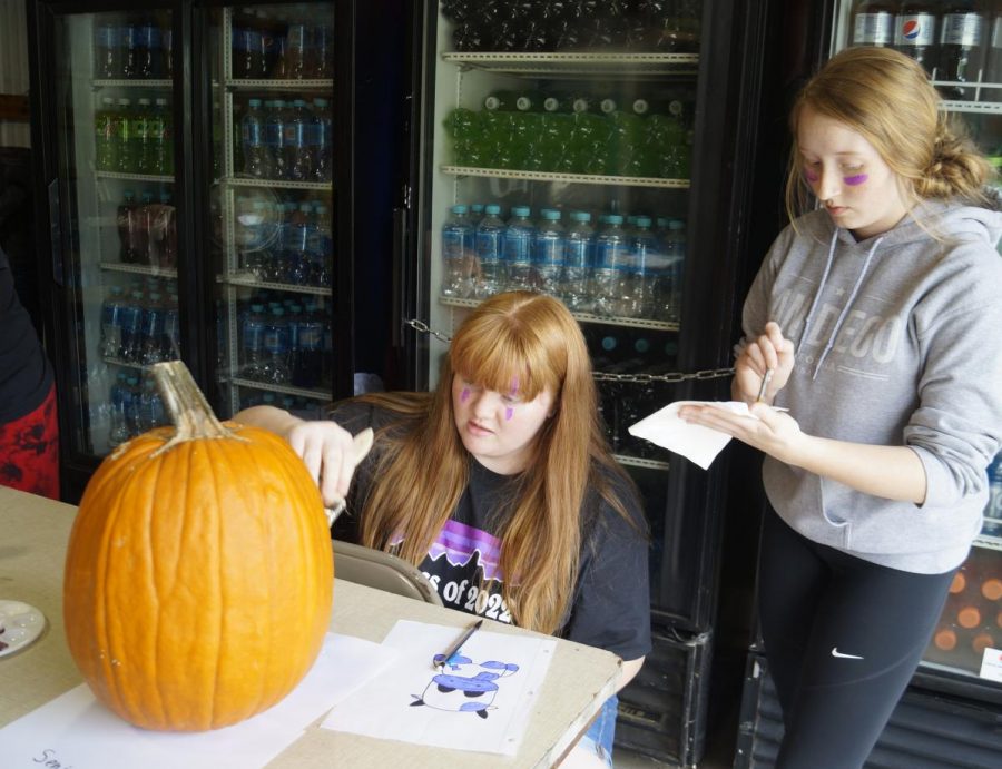 Seniors Emma Bryant and Anna Childs took first place in pumpkin painting.