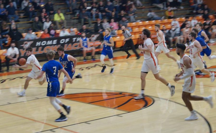 Chance Mott drives to the basket.