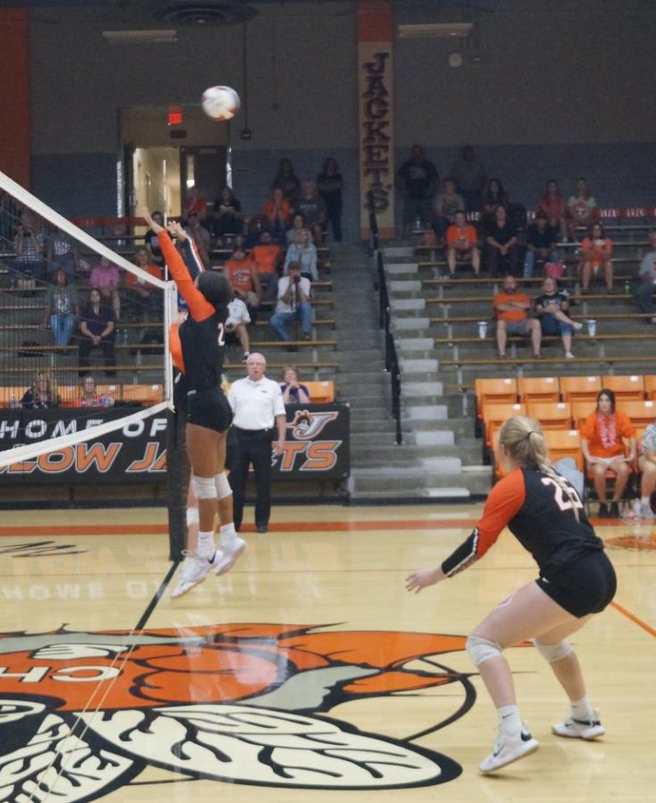Maleia Absher goes to the net against Red Bud.