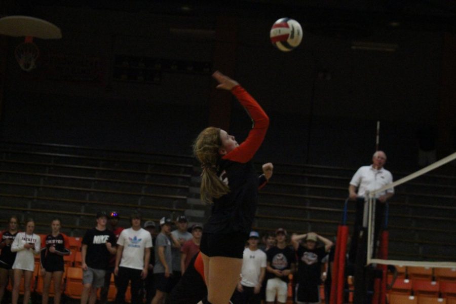 Mabry Wingerter goes to the net against Carlyle.