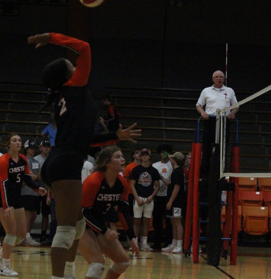 Maleia Absher goes to the net against Carlyle.
