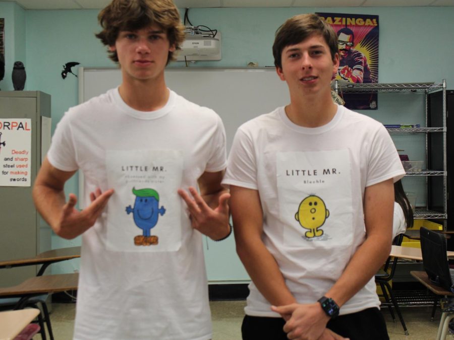 Chance Mott and Aidan Blechle display the shirts they for the Little Miss, Mr., Mx. theme day.