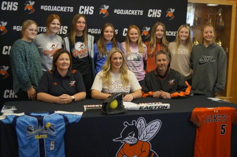 Emma Eggemeyer (front, center) signed a letter of intent to play softball for the St. Charles Community College Cougars.