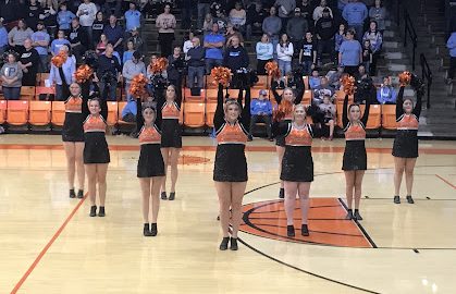 The Chester High School Dance Team performs at the boys' basketball home opener.