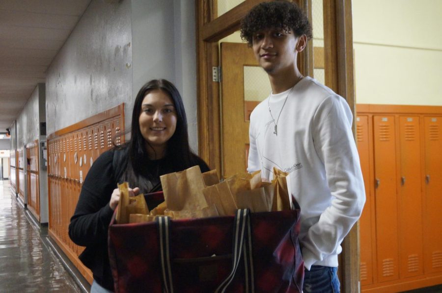Sydney Collins and Brayden Absher handed out goodie bags to teachers as part of FFA Week.