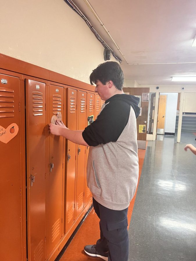 The Art Club designed Valentines Day hearts to paste on lockers.