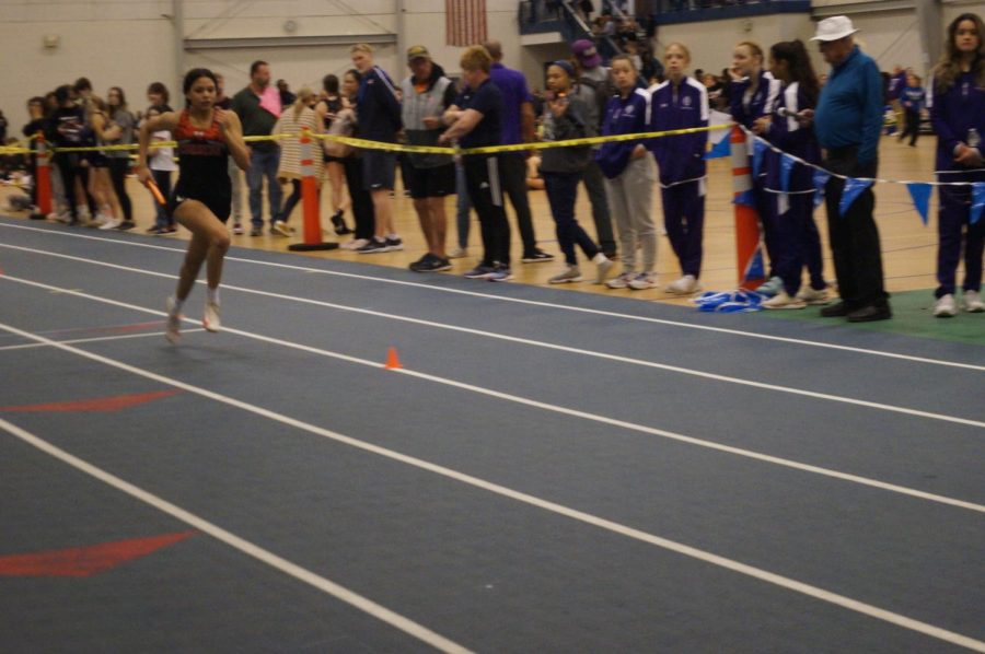 Jazzi Merideth running in her relay race.
