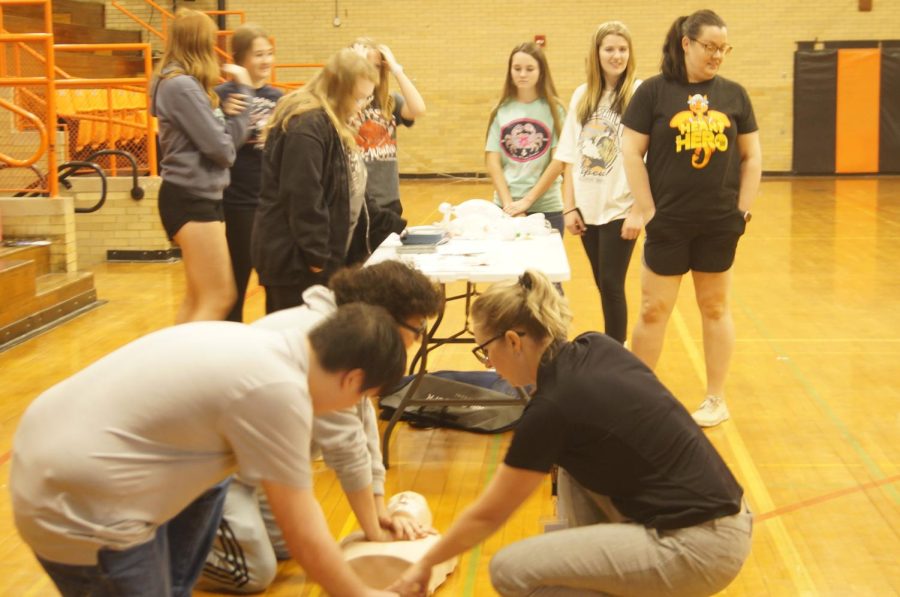 Students perform CPR in health class.