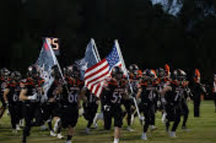 The Yellow Jackets run to take the field