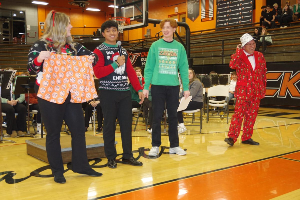 The 3 Drum Majors Giving Mr. Colonel His Gift