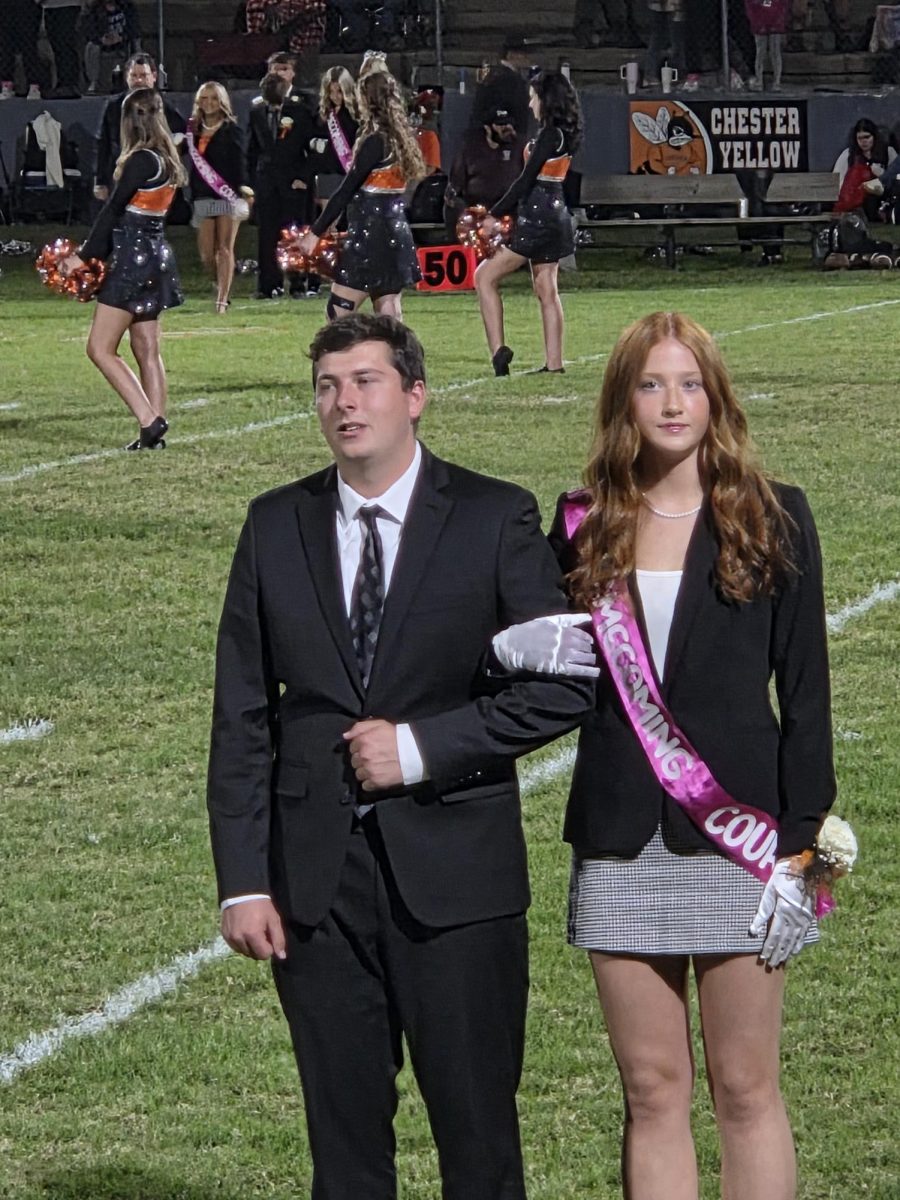 Aubrey Colvis with her escort Aidan Blechle