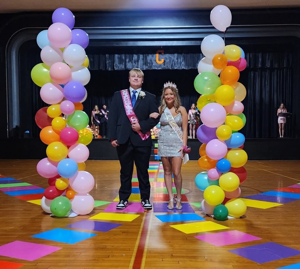Queen Callie Davis with her escort Brayden Juenger