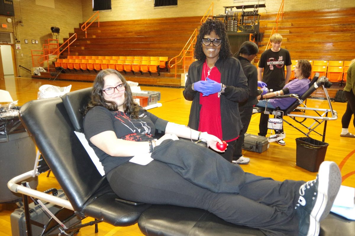 Chester High School student, Kiara Mathis donates blood.