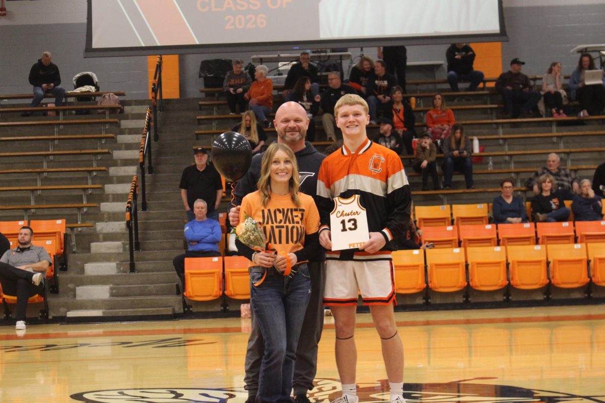 Senior Tray Peters with his parents